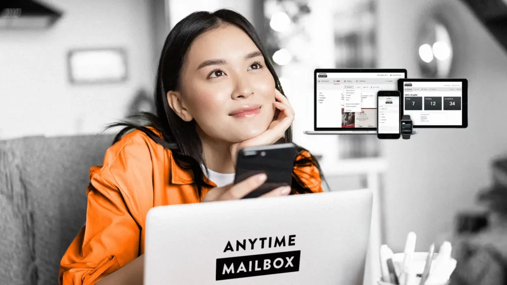 A woman with a thinking expression and holding a mobile phone. In front of her is a laptop with an Anytime Mailbox label. To the right are floating laptop, tablet, and mobile phone showingthe Anytime Mailbox website. 