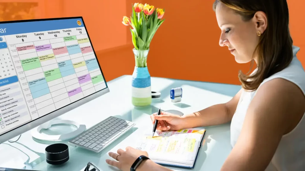 Woman checking holiday calendar schedule